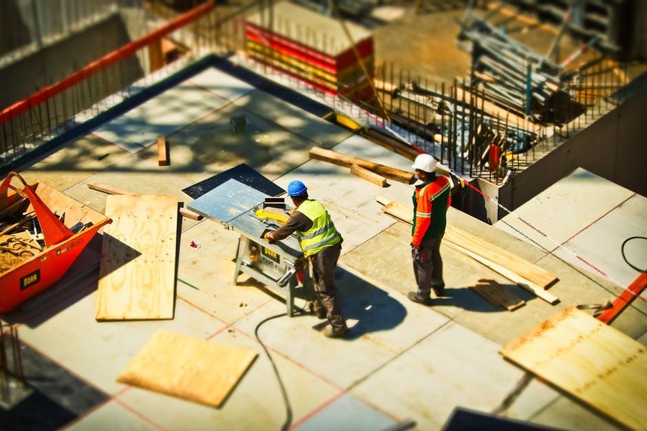 construction workers in the construction business expansion