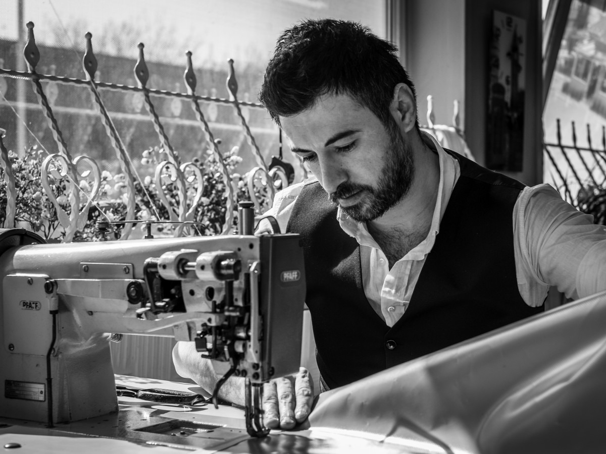 a tailor sewing at his machine analogy for a business