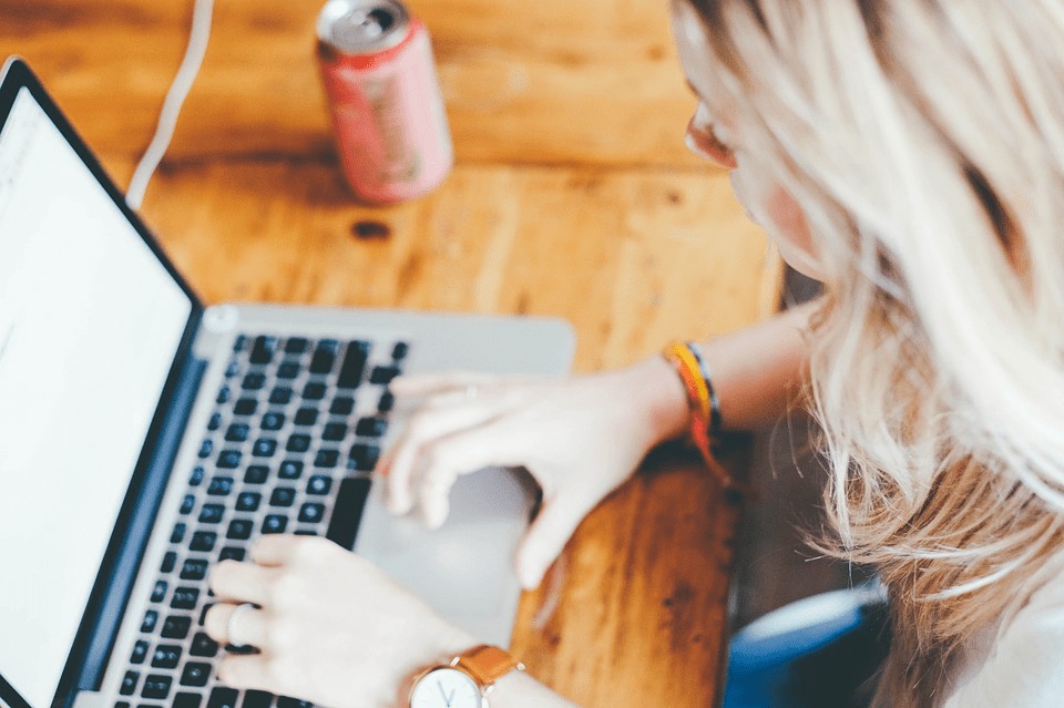 woman on keyboard laptop home benefits working remotely