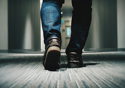 feet walking on carpet in the office carpets and business tips