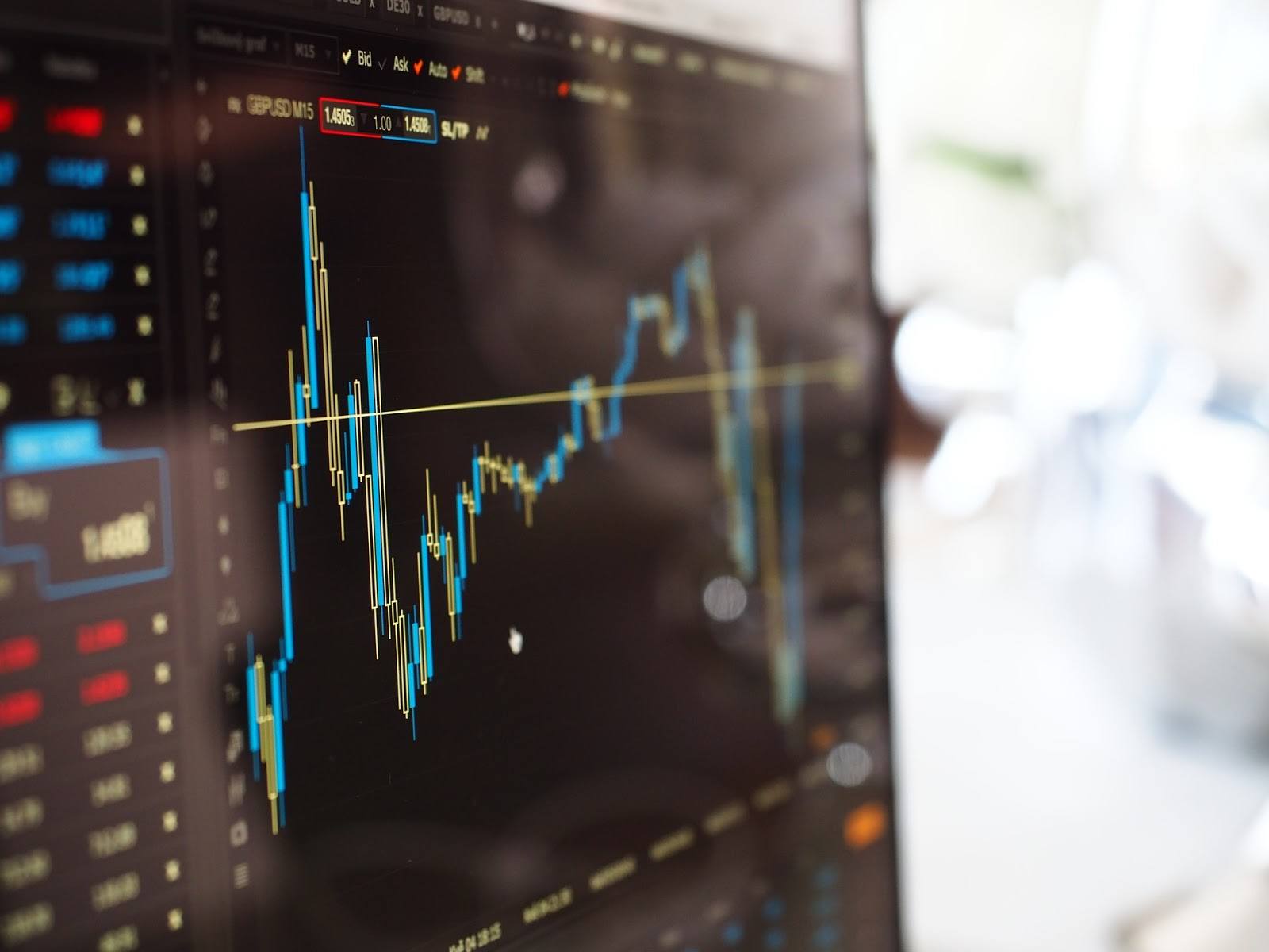 blue-and-yellow-graph-on-stock-market-monitor-159888/