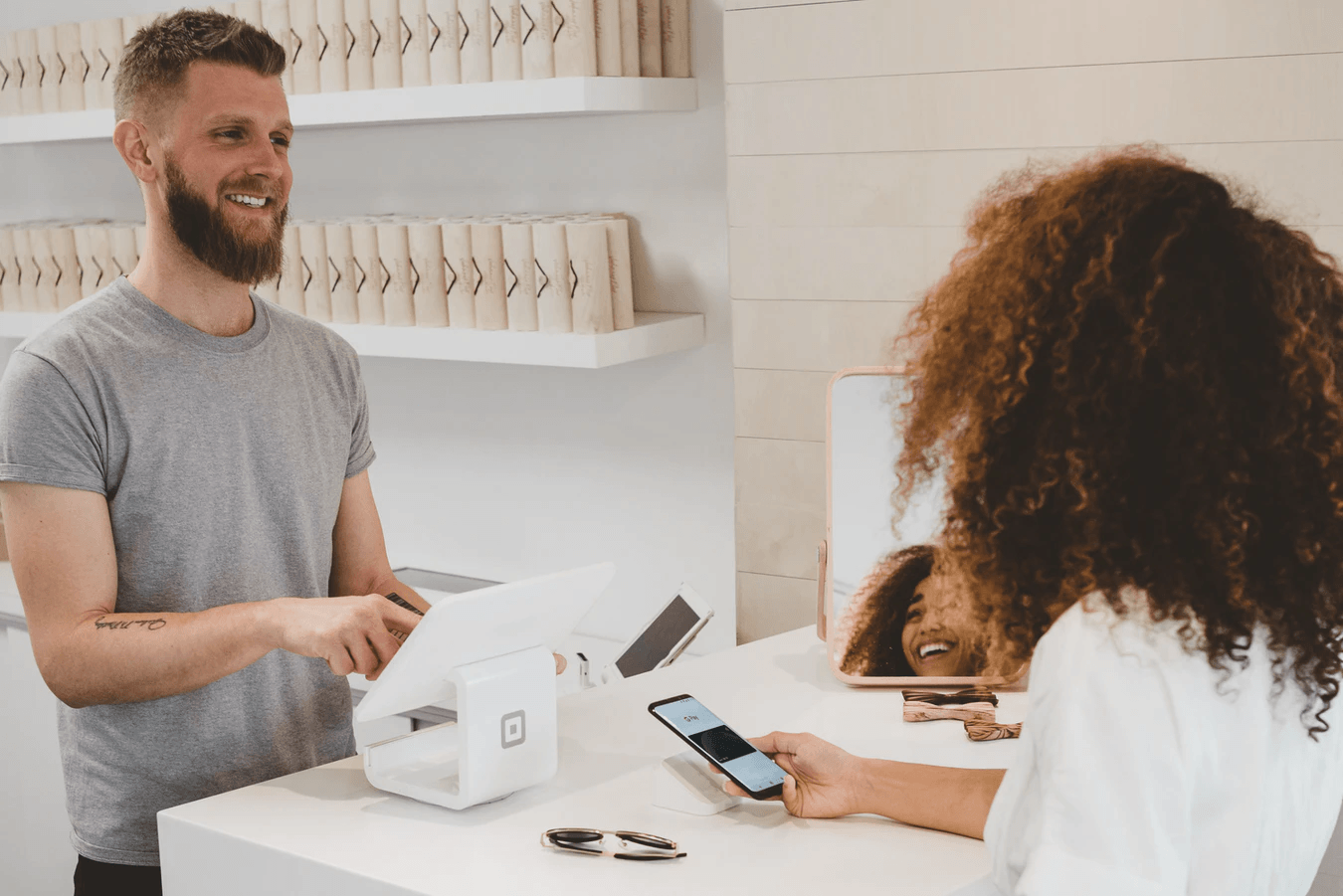 how to attract new customers customer at store making payment