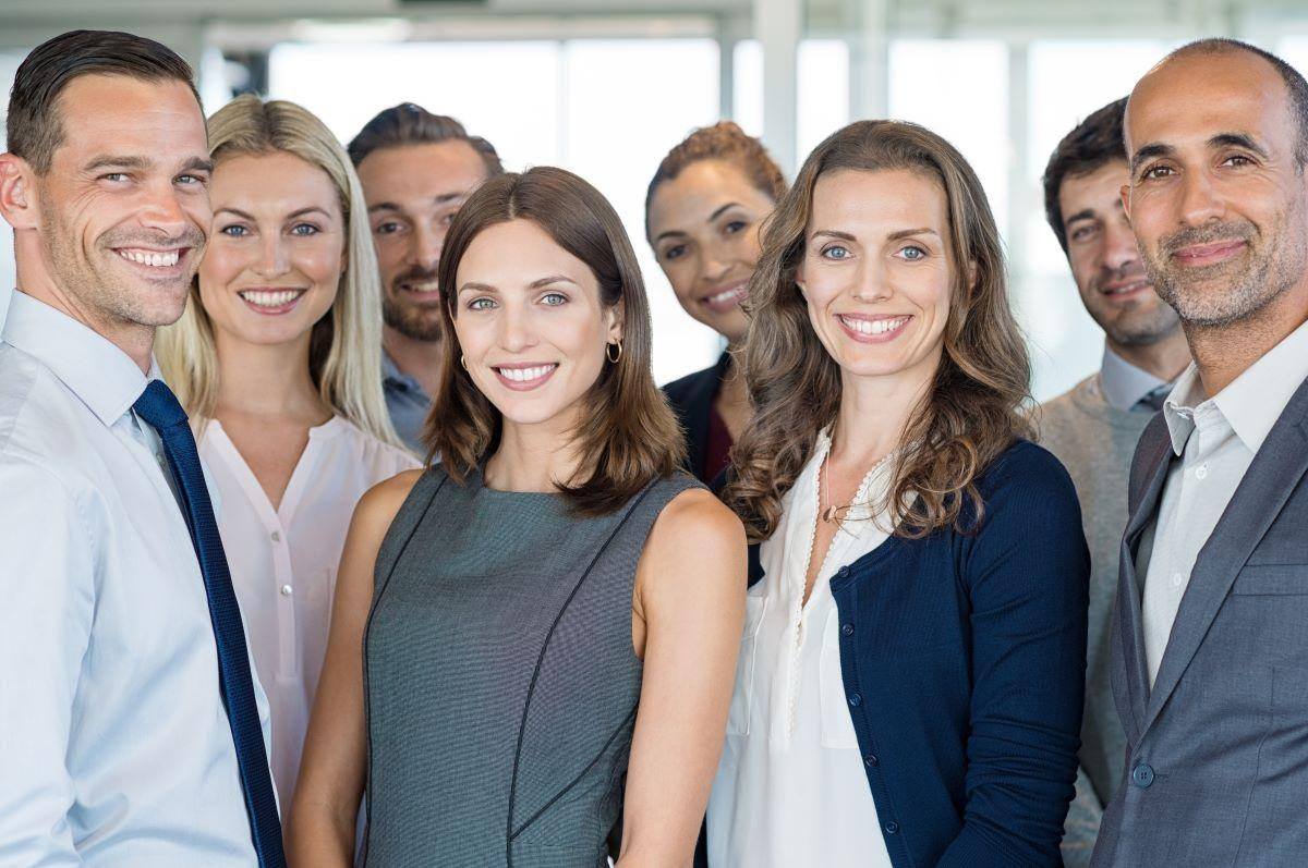 A group of people posing for a photo Description automatically generated