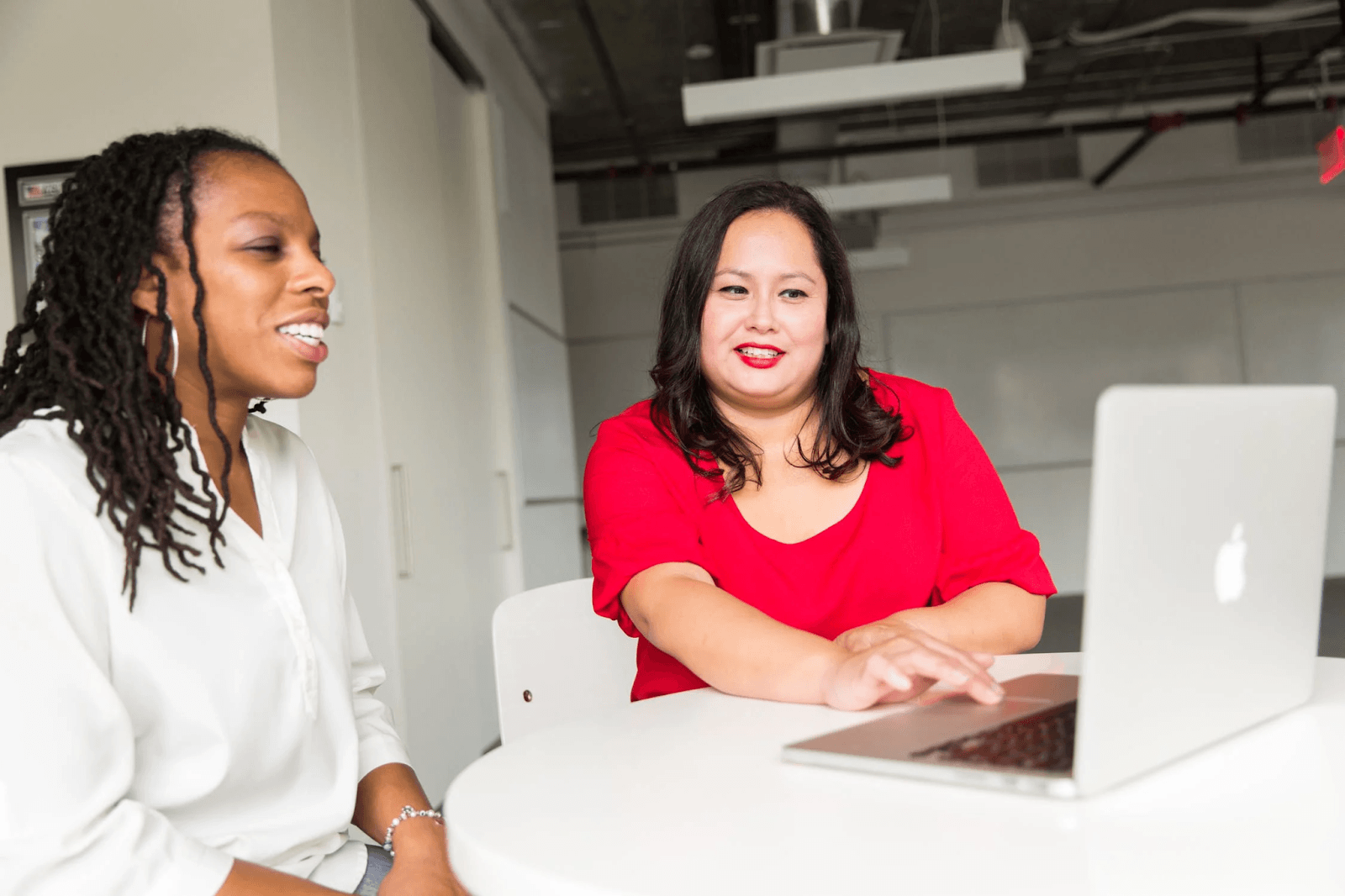 woman-wearing-red-top-holding-silver-macbook-1181722/ chance of success