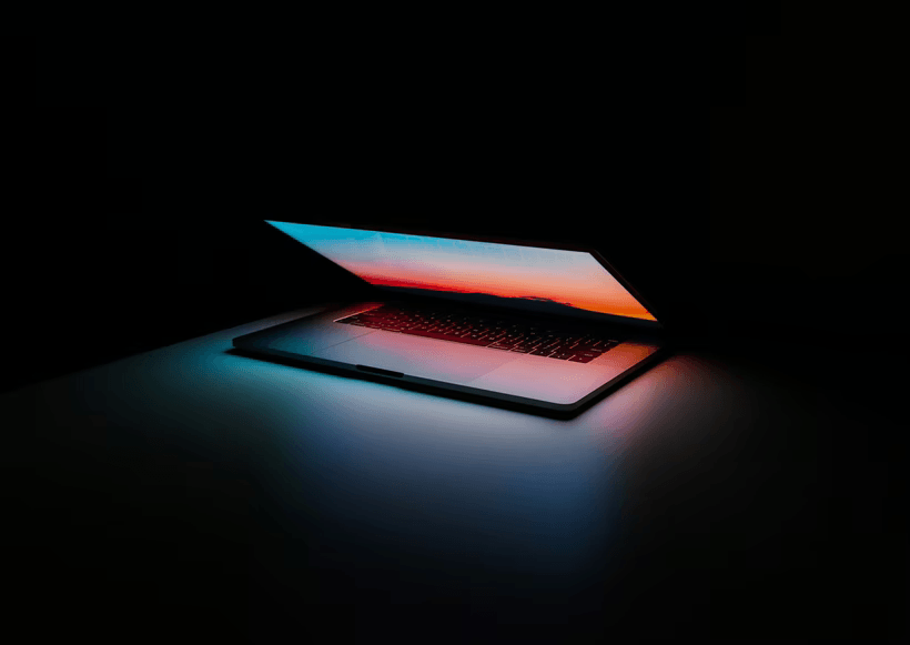 open laptop with night light tips being tech-savvy