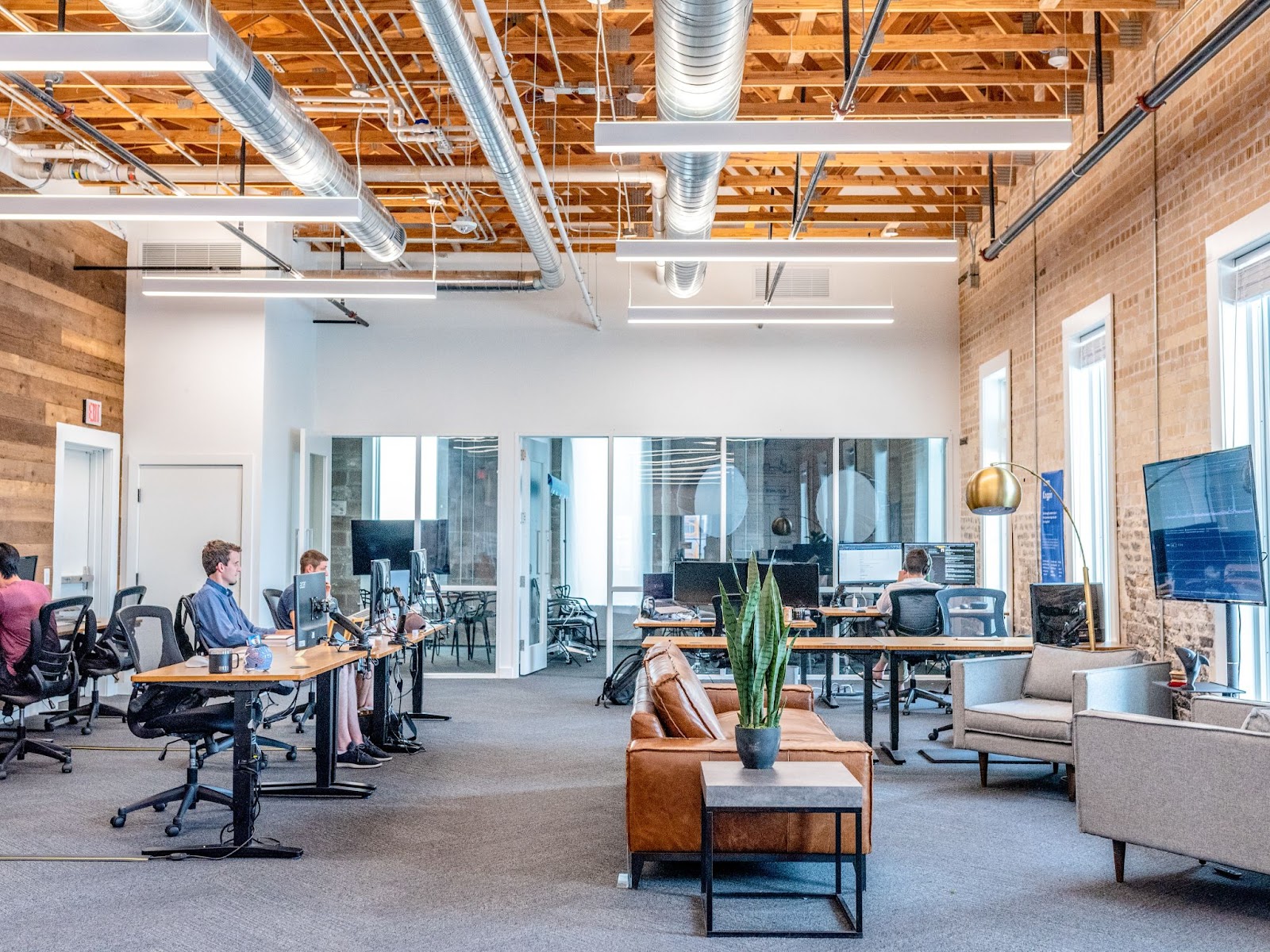 office-building with employees open ceiling maintenance tips for your business
