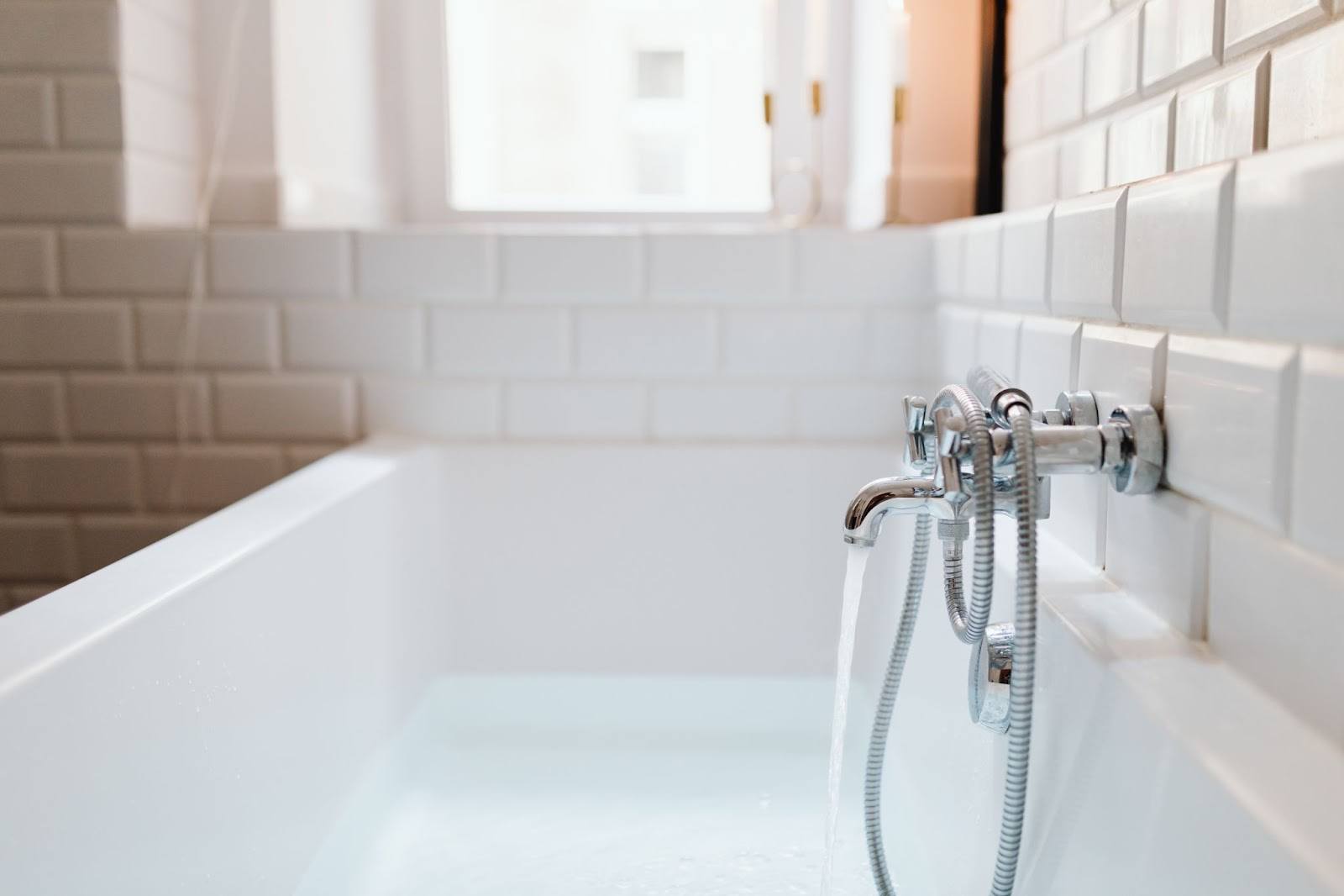 stainless-steel-faucet-mounted-on-ceramic-tiles-customer satisfaction plumbing business