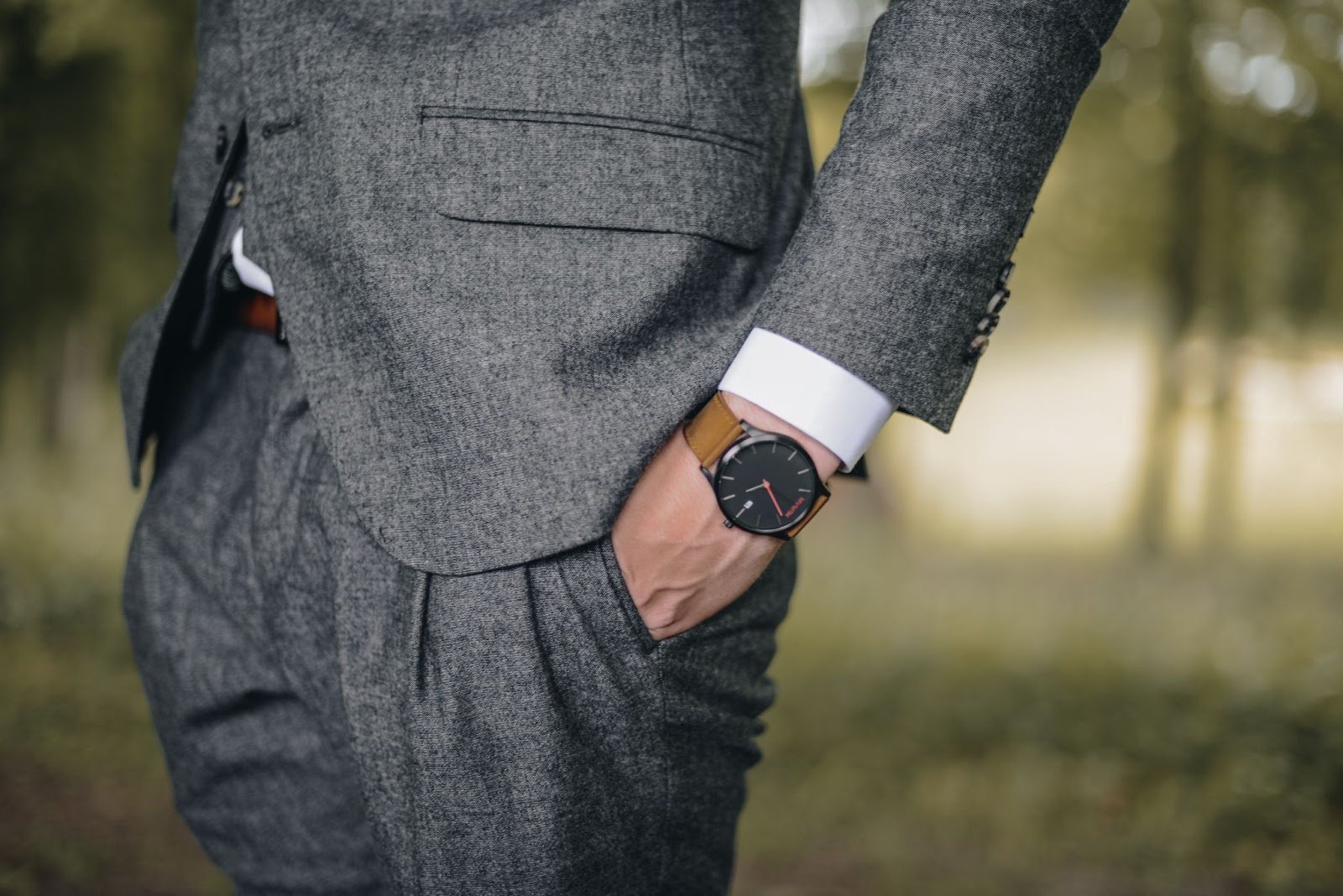 man-wearing-watch-with-hand-on-pocket-447570/ business dress code