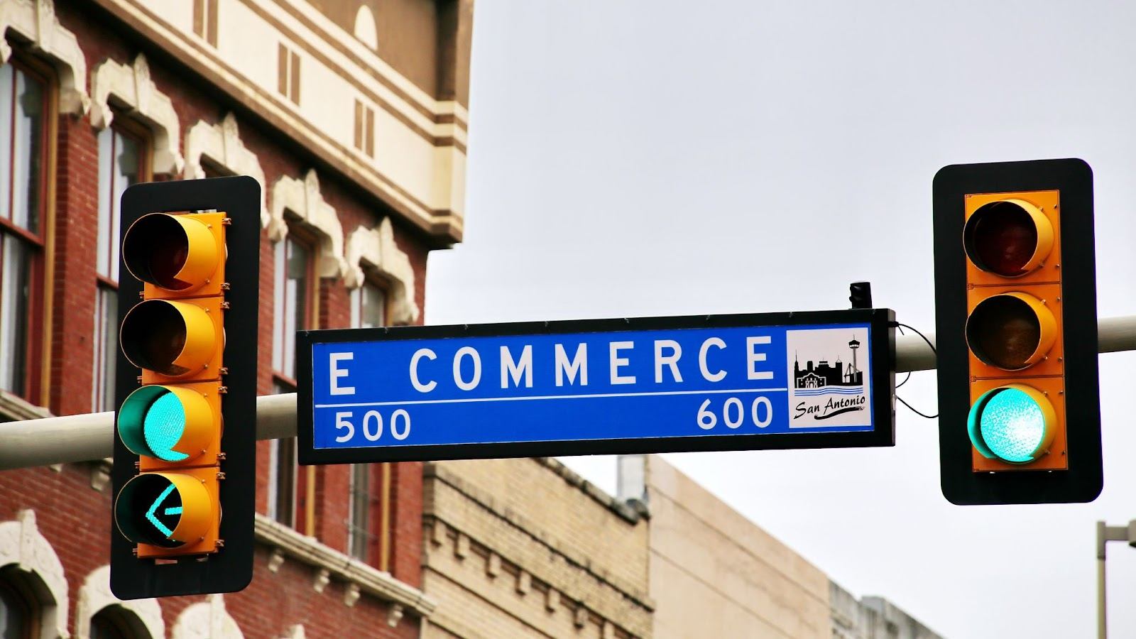 e commerce street sign beside a green stop light benefits of owning an ecommerce store