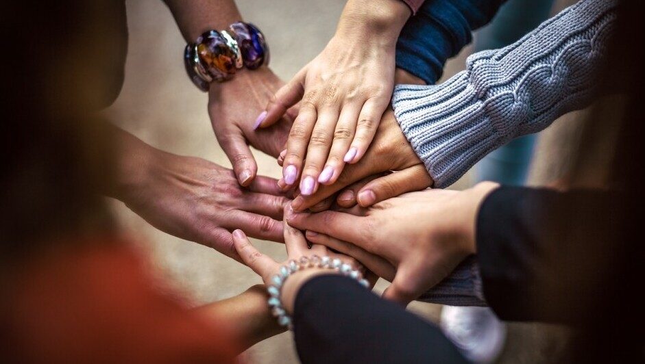 hands linked together