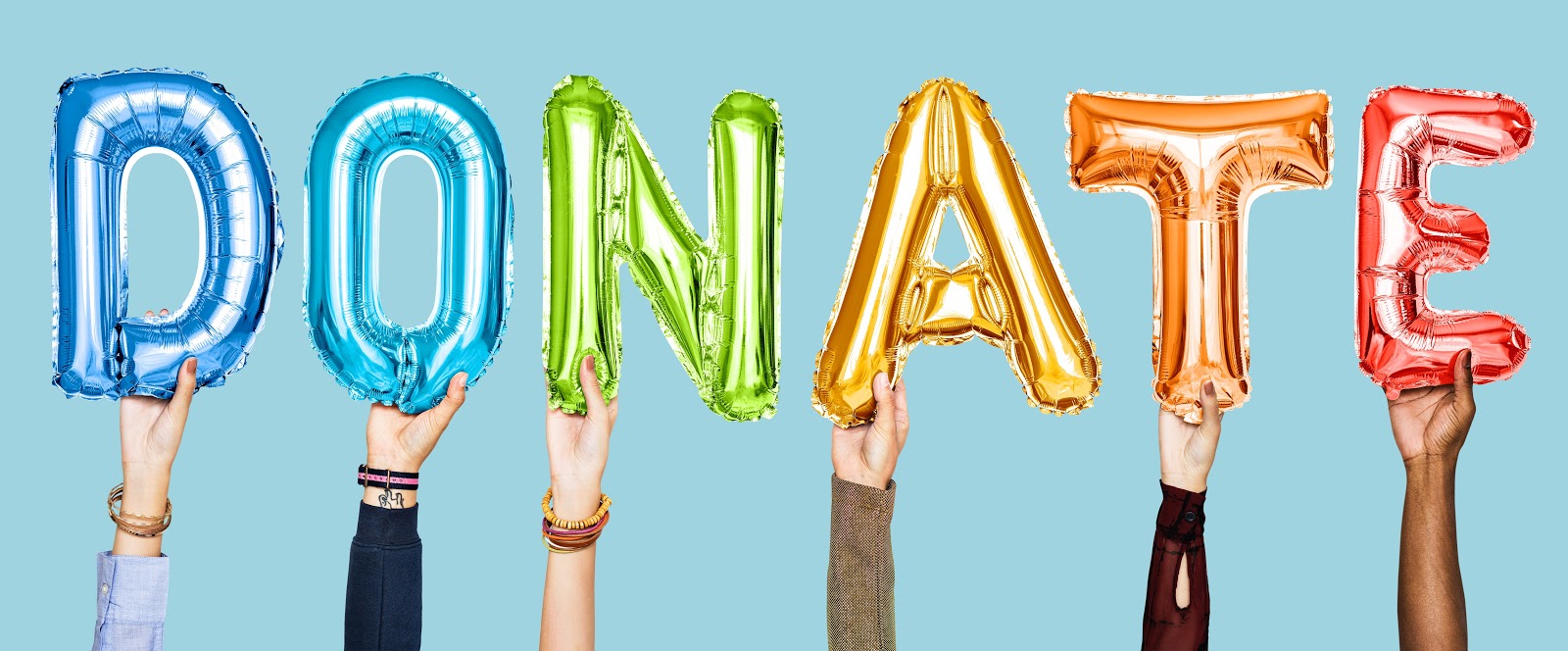 people-holding-assorted-coloured-balloons tips on how to start a charity